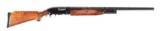(C) WINCHESTER MODEL 12 SLIDE ACTION SHOTGUN.
