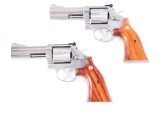 (M) LOT OF 2: SMITH & WESSON MODEL 686 CAPTAIN DAN COMBS COMMEMORATIVE REVOLVERS WITH BOXES AND CASE