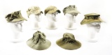 LOT OF 7: WORLD WAR II USMC RAIN HAT, FATIGUE HATS, AND DAISY MAE HATS.