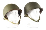 LOT OF 2: HIGH CONDITION US WORLD WAR II FRONT SEAM SWIVEL BALE HELMETS WITH LINERS.