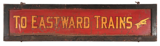 TO EASTWARD TRAINS HAND PAINTED METAL RAILROAD DEPOT SIGN W/ ORIGINAL WOOD FRAME.