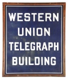 WESTERN UNION TELEGRAPH BUILDING PORCELAIN SIGN W/ ORIGINAL COPPER FRAMING.