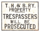CAST IRON TRESPASSER WARNING SIGN.
