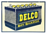 DELCO DRY CHARGE BATTERIES TIN SERVICE STATION SIGN W/ BATTERY GRAPHIC.
