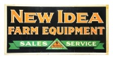 NEW IDEA FARM EQUIPMENT TIN SIGN W/ SELF FRAMED EDGE.