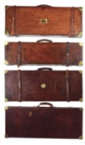 LOT OF 4: OAK AND LEATHER SHOTGUN CASES.