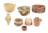 LOT OF 8: NATIVE AMERICAN BASKETS.