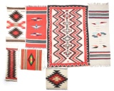 LOT OF 7: SOUTHWEST INDIAN AND MEXICAN RUGS.