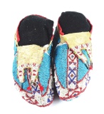 PAIR OF FULLY BEADED SOUIX CEREMONIAL MOCCASINS.