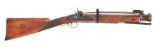(A) A GOOD IRON BARRELED BLUNDERBUSS WITH SPRING LOADED BAYONET, BRITISH ORDNANCE MARKS, CONVERTED T