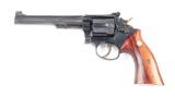 (C) SMITH AND WESSON K22 DOUBLE ACTION REVOLVER.