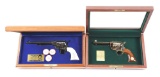 (M) LOT OF 2: DOC HOLLIDAY AND WYATT EARP TRIBUTE SINGLE ACTION REVOLVERS IN PRESENTATION CASES.