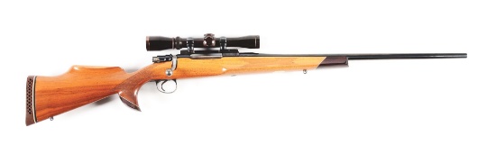 (C) WINSLOW ARMS CO. .243 WINCHESTER BOLT ACTION RIFLE WITH LEUPOLD SCOPE.