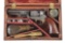 (A) CASED GUSTAVE YOUNG FACTORY ENGRAVED COLT 1849 POCKET PERCUSSION REVOLVER.