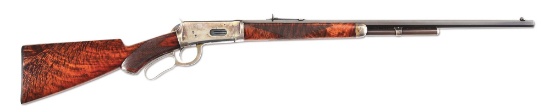 (A) RARE WINCHESTER MODEL 1894 DELUXE RIFLE WITH FACTORY CASE HARDENED FRAME.