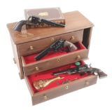 (C) COLT AMERICAN BICENTENNIAL COMMEMORATIVE 3 REVOLVER SET IN DISPLAY CABINET.