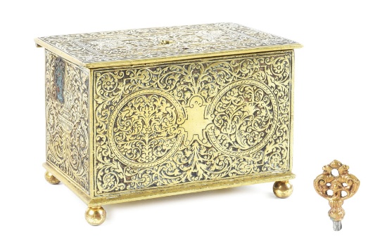 A BRASS LOCKBOX WITH FLORAL AND MYTHICAL DECORATIONS IN THE NUREMBERG STYLE.