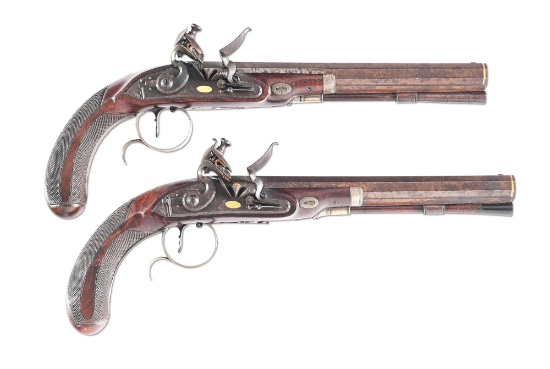 (A) AN EXCELLENT PAIR OF HIGH QUALITY JAMES HASLETT SILVER MOUNTED FLINTLOCK PISTOLS.