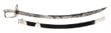 SILVER PLATED LION POMMEL CAVALRY SABER WITH BOLDLY ENGRAVED SCABBARD.