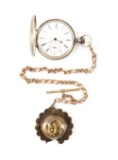 POCKET WATCH WITH CONFEDERATE CAVALRY BRIDLE ROSETTE AS WATCH FOB.