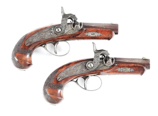 (A) LOT OF 2: ATTARCTIVE AND RARE MATCHED PAIR OF SILVER MOUNTED HENRY DERINGER POCKET PISTOLS.
