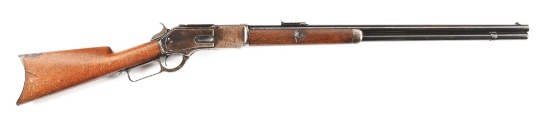 (A) WINCHESTER MODEL 1876 LEVER ACTION RIFLE.