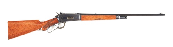 (C) WINCHESTER MODEL 1886 SEMI-DELUXE LIGHTWEIGHT TAKEDOWN LEVER ACTION RIFLE.
