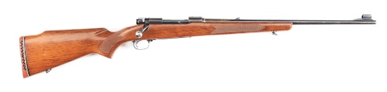 (C) WINCHESTER MODEL 70 PRE 64 FEATHERWEIGHT BOLT ACTION RIFLE.