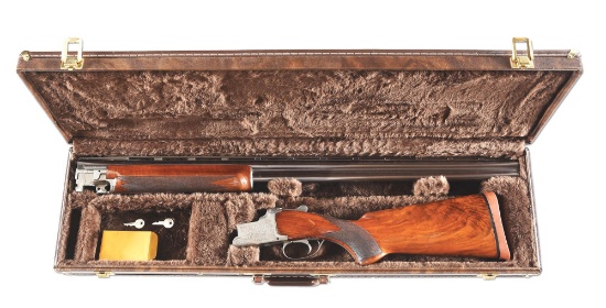 (C) BROWNING SUPERPOSED OVER/UNDER SHOTGUN WITH CASE.