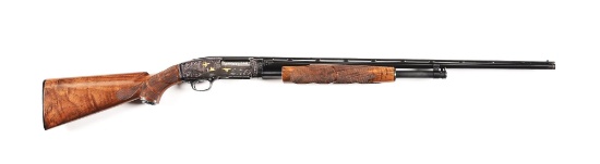 (C) ENGRAVED WINCHESTER MODEL 42 SLIDE ACTION SHOTGUN.