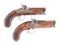 (A) PAIR OF PERCUSSION GREATCOAT PISTOLS BY HEWSON.