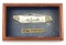CASE MOBY DICK COMEMMORATIVE FOLDING KNIFE WITH IVORY SCRIMSHAW HANDLE AND SILVER MOUNTS WITH DISPLA