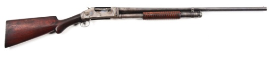 (C) WINCHESTER MODEL 1897 SLIDE ACTION SHOTGUN.