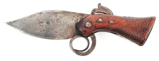 VERY EARLY PRIMITIVE KNIFE IN THE SHAPE OF A PISTOL.