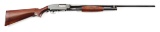 (C) WINCHESTER MODEL 12 SLIDE ACTION SHOTGUN.