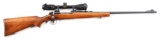 (C) REMINGTON MODEL 721 BOLT ACTION RIFLE.