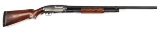 (C) WINCHESTER MODEL 12 SLIDE ACTION SHOTGUN.