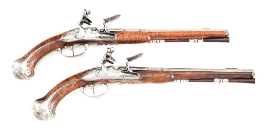 (A) FINE PAIR OF SILVER MOUNTED FLINTLOCK HORSEMAN'S PISTOLS BY J.C. SAPS OF BERLIN, PROBABLY FOR AN