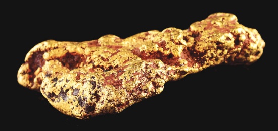 POUND OF GOLD GOLD NUGGET IN BOOK COVER CASE.