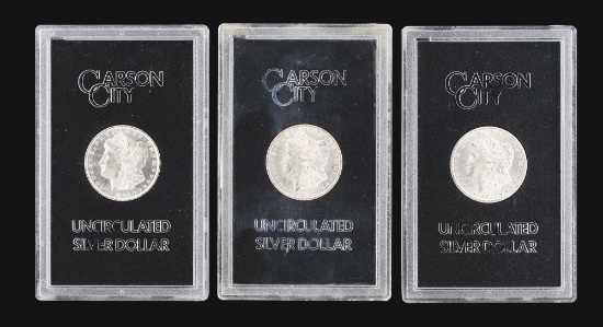 LOT OF 3: CARSON CITY MORGAN SILVER DOLLARS IN GSA HOLDERS.