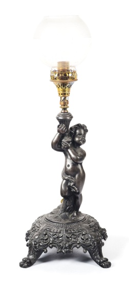 FIGURAL METAL CUPID LAMP.