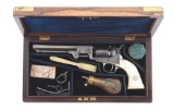 (A) FACTORY ENGRAVED COLT MODEL 1849 POCKET REVOLVER WITH RARE PEARL GRIPS AND CASE.