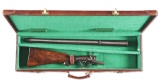 (C) RIGBY HAMMER FIRED DOUBLE RIFLE IN .303 BRITISH, CASED.