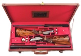 (M) A TRUE PAIR OF PIOTTI BEST QUALITY SLE 12 GAUGE OVER/UNDER SHOTGUNS WITH SCROLLWORK AND GAME SCE