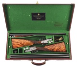 (M) DELUXE PAIR OF HOLLAND & HOLLAND 12 GAUGE SIDE BY SIDE SLE ROYALS WITH GAME SCENES SIGNED BY KEN