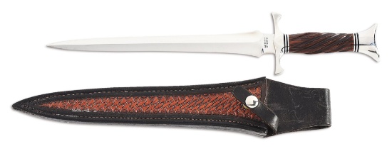 BUSTER WARENSKI FLUTED GRIP DAGGER WITH TOOLED LEATHER SCABBARD.