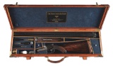 (C) CASED A.H. FOX XE GRADE 12 BORE SIDE BY SIDE SHOTGUN.