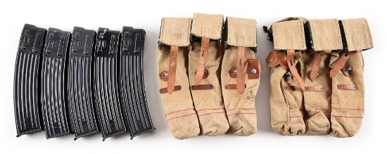 PAIR OF ORIGINAL ST. VITH CAPTURED MP-44 MAGAZINE POUCHES WITH 5 ORIGINAL MAGAZINES.