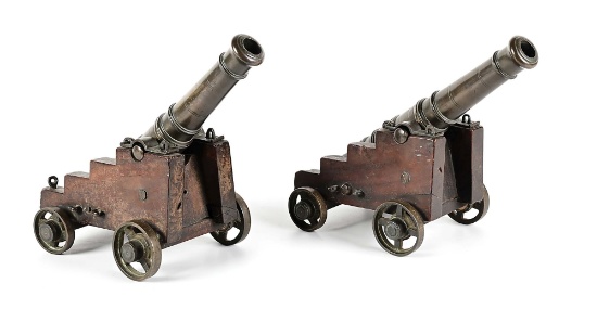 PAIR OF SIGNAL CANNONS ON CARRIAGES