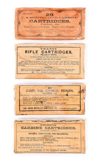 LOT OF 4: BOXES OF ANTIQUE RIFLE AND CARBINE AMMUNITION.